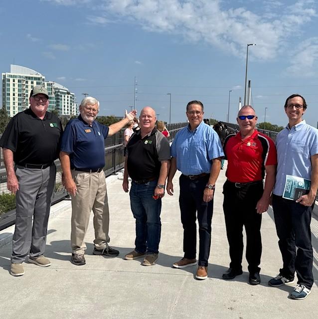 Papio NRD representatives standing on the "Baby Bob" pedestrian bridge.
